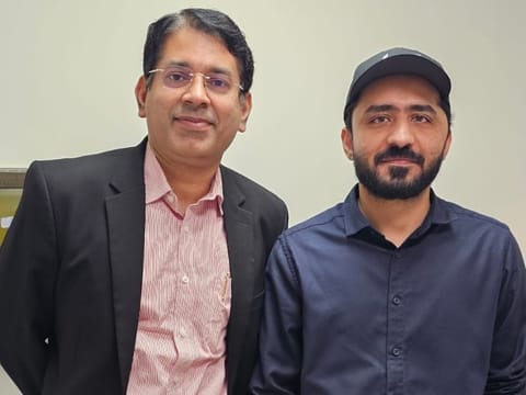 Dr Prakash Nair, Consultant Neurosurgery, Aster Hospital Mankhool, with Emad Arif Khan.