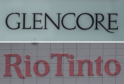 This combination of file images made on January 8, 2026, shows (top) the logo of commodity trading and mining company giant Glencore in Baar on May 28, 2025; and (bottom) the logo of global mining and metals company Rio Tinto in Perth on November 24, 2025.