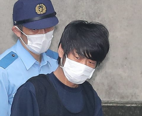 The gunman charged with killing Japan's former prime minister Shinzo Abe was found guilty Wednesday and jailed for life, more than three years after the broad-daylight assassination shocked the world.