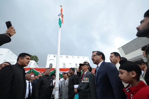 Indian expats attend the flag hoisting ceremony at the Indian Consulate in Dubai on Monday. The ceremony was delayed by 15 minutes due to rain.