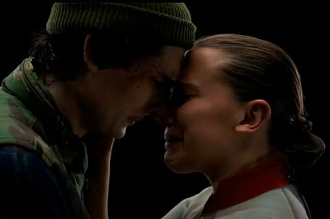 Finn Wolfhard and Millie Bobby-Brown as Mike Wheeler and Eleven in Stranger Things.