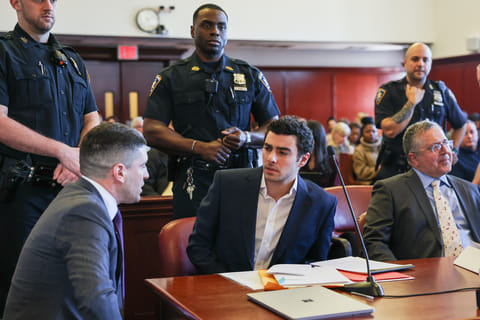 Luigi Mangione appears in Manhattan Criminal Court for an evidence hearing, Dec. 18, 2025, in New York.