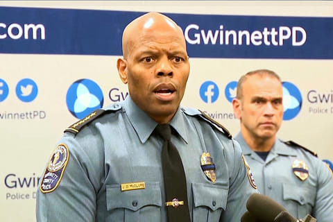 An image taken from WSB video shows Gwinnett County Police Chief J.D. McClure speaks at a news conference Sunday, Feb. 1, 2026, in Gwinnett County, Ga., following the shootings of two officers at a hotel.