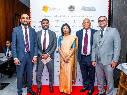 Professor Arusha Cooray, Ambassador of Sri Lanka to the UAE, Suren Swaminathan, SLBC Chairman at the SLBC Exhibition Pavilion.