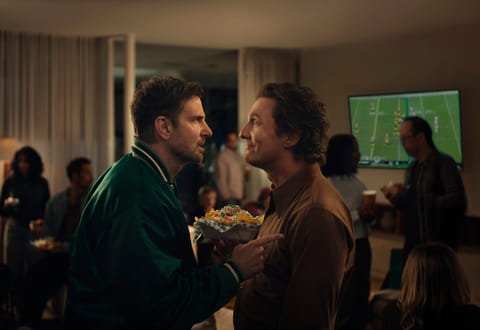 This undated image provided by Uber Eats shows Bradley Cooper, left, and Matthew McConaughey in a scene from the Uber Eats 2026 Super Bowl NFL football spot.