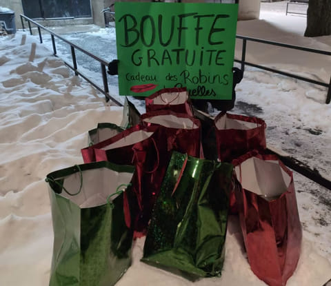 A group of activists inspired by Robin Hood in Montreal said they raided a grocery store for food, then left some of the spoils outside of an apartment building nearby.