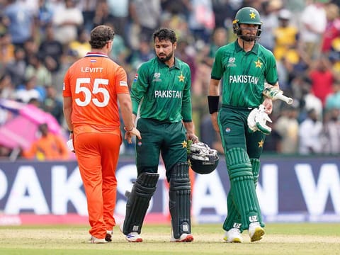 Netherlands' Michael Levitt, left, shakes hands with Pakistan's Faheem Ashraf as he leaves with teammate Shaheen Shah Afridi after Pakistan won their T20 World Cup match in Colombo, Sri Lanka, Saturday, February 7, 2026.