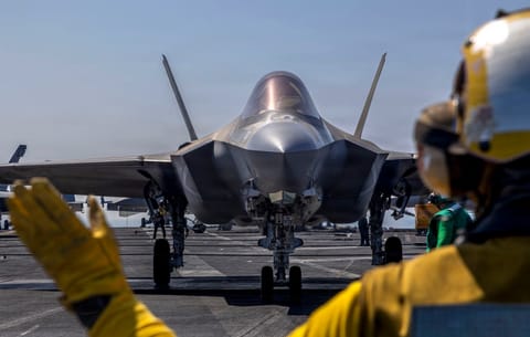 An F-35C Lightning II, attached to Marine Fighter Attack Squadron (VMFA) 314, as it prepares to launch from the flight deck of Nimitz-class aircraft carrier USS Abraham Lincoln (CVN 72) in the Arabian Sea.