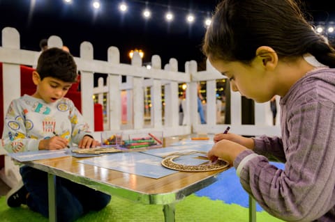 Visitors explore Andalus heritage, storytelling and family workshops.