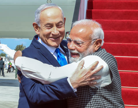 Prime Minister Narendra Modi receives a warm welcome from Israeli Prime Minister Benjamin Netanyahu on his arrival at Ben Gurion International Airport for a two-day state visit to Israel, in Tel Aviv on Wednesday.