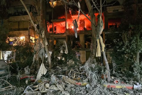 A fire is seen in a damaged building after an Israeli airstrike in Beirut's southern suburb neighborhood of Haret Hreik on March 2, 2026.