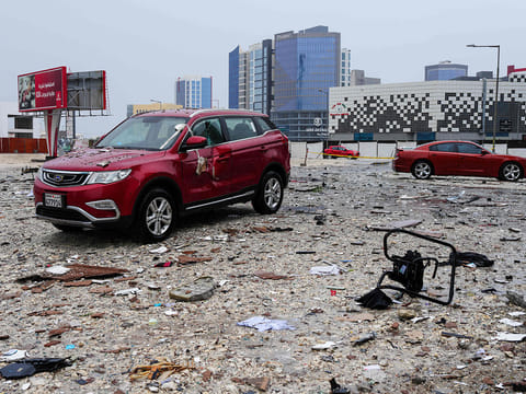 A photograph shows the damage in the aftermath of a drone strike in the Seef district of Manama on March 10, 2026.
