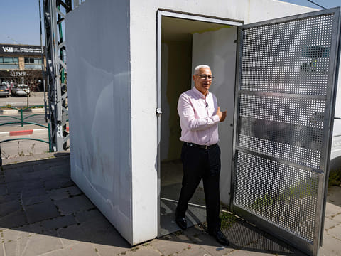 Mayor Mazen Ghnaim comes out after inspecting a bomb shelter in the Arab town of Sakhnin in northern Israel near the Lebanese border on March 12, 2026.