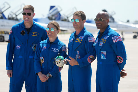 Artemis 2 crew members, from left, Mission Spc. Jeremy Hansen, of Canada, Mission Spc. Christina Koch, Commander Reid Wiseman, and Pilot Victor Glover pose for a photo after the crew's arrival at the Kennedy Space Centre Friday, March 27, 2026, in Cape Canaveral, Fla.