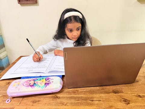 Praseetha Rajesh's daughter Anvi attending online class from her home.