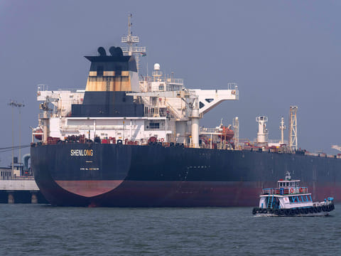Liberia-flagged tanker Shenlong Suezmax, carrying crude oil from Saudi Arabia, that arrived clearing the Strait of Hormuz, is seen at the Mumbai Port in Mumbai, India, Thursday, March 12, 2026.
