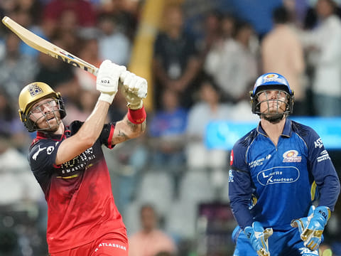 Royal Challengers Bengaluru's Phil Salt hits a six during the IPL 2026 match against Mumbai Indians, in Mumbai, on Sunday, April 12, 2026.