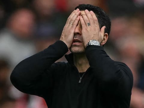 Mikel Arteta reacts to Alex Scott's winner as his side drop points in the Premier League title race