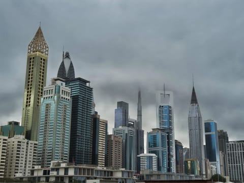 NCM forecasts dust, stronger winds and possible rain from Tuesday.