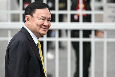 Thailand's former Prime Minister Thaksin Shinawatra arrives at the Supreme Court in Bangkok on September 9, 2025, ahead of a ruling on whether he properly served a prison term in 2023.