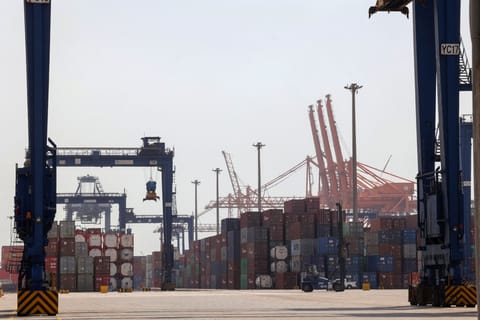 A picture taken March 1, 2022 shows a view of cranes and shipping containers at a loading dock of Jeddah's Islamic Seaport on Saudi Arabia's western Red Sea coast.