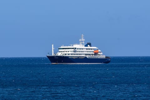 A general view of the cruise ship MV Hondius stationary off the port of Praia, the capital of Cape Verde, on May 3, 2025.