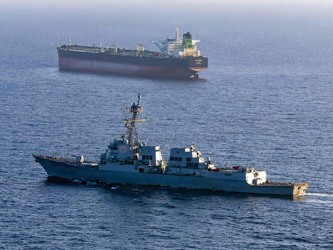 The Arleigh Burke-class guided-missile destroyer USS Rafael Peralta (DDG 115) implementing a maritime blockade against the Iran-flagged crude oil tanker vessel Stream while the latter was attempting to sail toward an Iranian port.