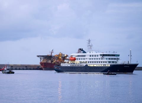 The Dutch-flagged hantavirus-stricken cruise ship MV Hondius arrives at the industrial port of Granadilla de Abona on the island of Tenerife in Spain's Canary Islands to start evacuation of passengers and most crew members on Sunday, May 10, 2026.