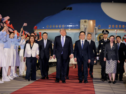 US President Donald Trump arrives aboard Air Force One at Beijing Capital International Airport during his visit to the country, in Beijing, China