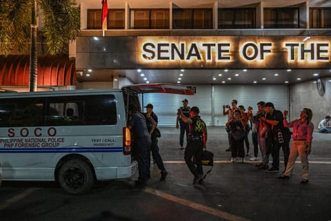Members of the Scene of the Crime Operatives (SOCO) arrive after the exchange of gunshots inside the Senate of the Philippines in Pasay, Metro Manila on May 13, 2026.
