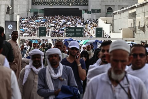Muslim worshippers leave the Grand Mosque complex after offering prayers in the holy city of Mecca on May 24, 2026, ahead of the annual Hajj pilgrimage.