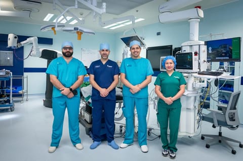 Dr Rozh Jalil, Consultant Urological Surgeon and Andrologist, with his team at American Hospital Dubai Science Park