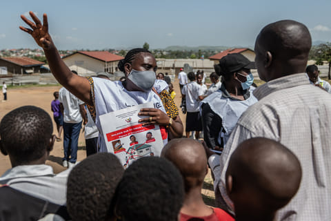 Vanny Birungi, a Red Cross volunteer, speaks to people during a public sensitisation campaign amid the Ebola outbreak in Bunia, Congo, Monday, May 25, 2026.