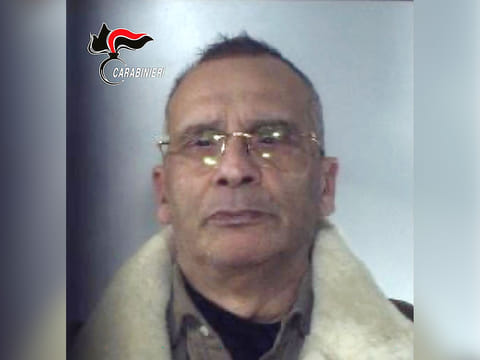 This handout photo taken and released by the Italian Carabinieri Press Office on January 16, 2023, shows the last picture of Italy's top wanted mafia boss, Matteo Messina Denaro in Palermo, following his arrest in his native Sicily after 30 years on the run.