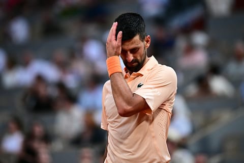 Serbia's Novak Djokovic reacts to his defeat at the end of his men's singles match against Brazil's Joao Fonseca on day 6 of the French Open tennis tournament on Court Philippe-Chatrier at the Roland-Garros Complex in Paris on May 29, 2026.
