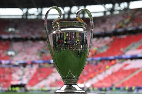 The trophy is displayed on the pitch prior to the UEFA Champions League final football match between Paris Saint-Germain (PSG) and Arsenal FC at the Puskas Arena in Budapest on May 30, 2026.