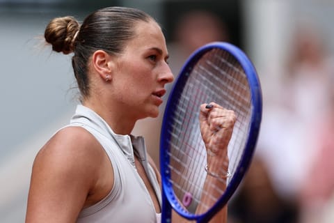 Ukraine's Marta Kostyuk reacts after a point as she plays against Poland's Iga Swiatek during their women's singles match on day 8 of the French Open tennis tournament on Court Philippe-Chatrier at the Roland-Garros Complex in Paris on May 31, 2026.