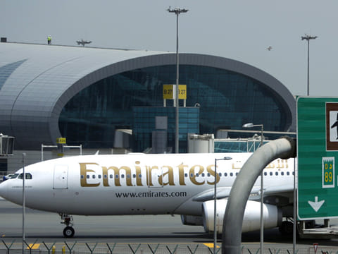 An Emirates flight taxis at the Dubai International Airport in Dubai.