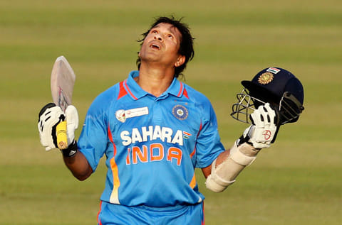 Sachin Tendulkar celebrates scoring his 100th century during the Asia Cup cricket match against Bangladesh, in Dhaka, Bangladesh, on March 16, 2012.