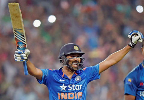 India's Rohit Sharma celebrates his knock.