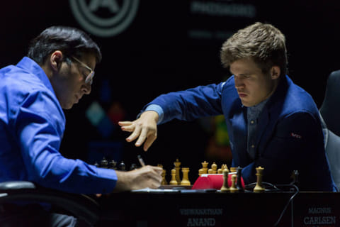 Norway’s Magnus Carlsen, right, will defend his world champion title against Russia's Ian Nepomniachtchi at Dubai Exhibition Centre in November, 2021