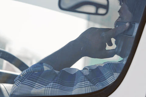 New radars across Abu Dhabi emirate will notify drivers if they fail to buckle up in the car. Notifications will also be sent by SMS if a driver is found using a hand-held device