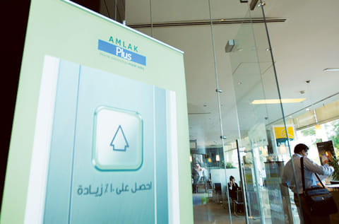 File photo: Customers in a branch of mortgage firm Amlak. File photo: