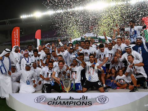 Al Nasr players celebrate with their trophy after winning the President's Cup a few years back.