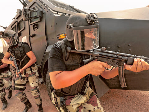 File picture shows members of the Saudi Arabia Riyadh Swat team practice tactical manoeuvres.