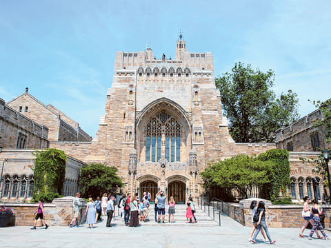 The Sterling Memorial Library at Yale University. The cost to attend the New Haven, Connecticut school for the 2024-25 year is $91,000 and financial aid is awarded by need.