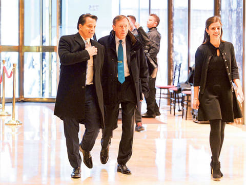 Anthony Scaramucci (left) walks with David Petraeus, former director of the CIA, at Trump Tower in New York.