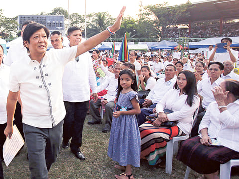 File photo: Senator Ferdinand “Bongbong” Marcos Jr., the son of the late Philippine strongman Ferdinand Marcos, waves to the crowd be he talks at a gathering of a religious group in suburban Quezon city, north of Manila, Philippines on Sunday. Five candidates are running for President in the coming elections this May.
