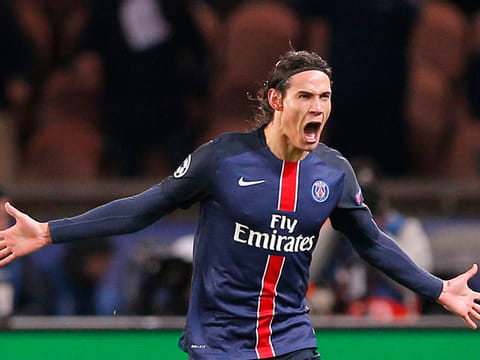 PSG's Edinson Cavani celebrates his goal during the Champions League round of 16, 1st leg soccer match between Paris Saint Germain and Chelsea at the Parc des Princes stadium in Paris, France.