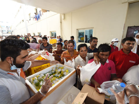 Dubai Volunteering Center with other social groups distribute meals to workers in DIP as part of their Honour Labour campaign, organized by the Community Development Authority. Picture for illustrative purpose only.
